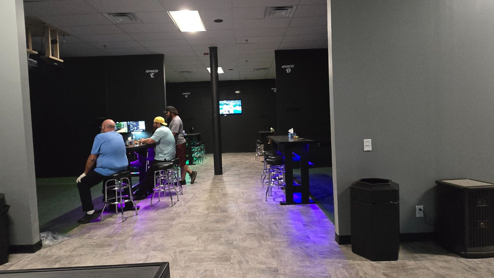 Advanced golf simulator bays